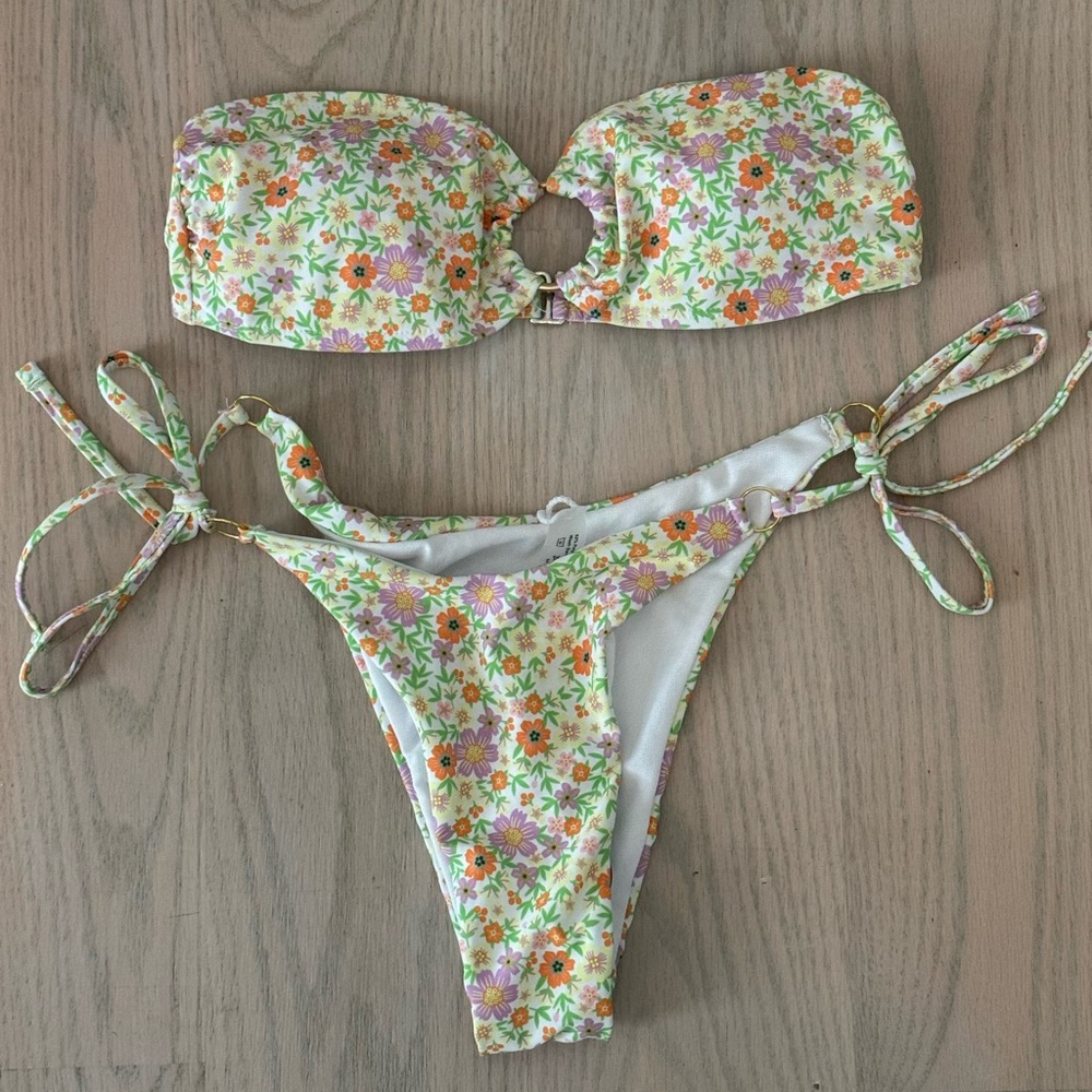 Never worn, too many bathing suits. Not my color. Taking offers